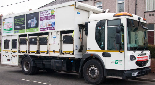 Council recycling vehicle displaying advertising