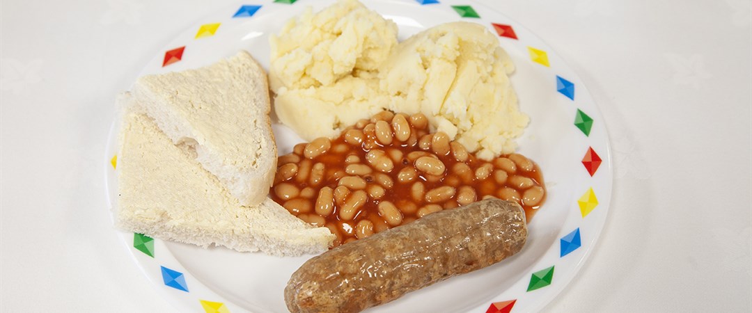 Sausages with mashed potato and beans