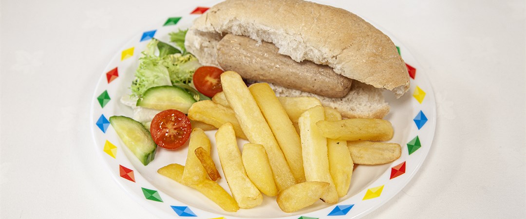 Veggie sausage sub with chips and side salad