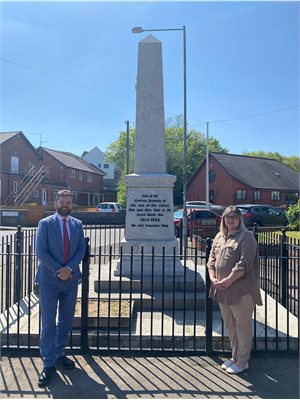 Councillors Hunt and Owen standing near the restored War memorial