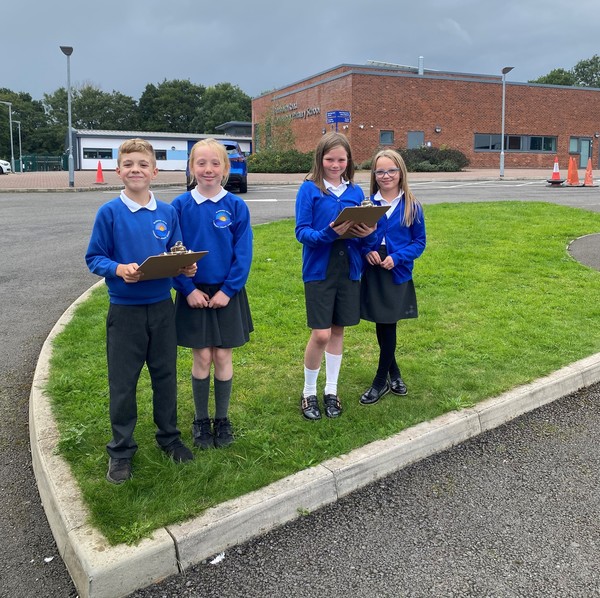 Children monitoring traffic at Blenheim Road Community Primary School