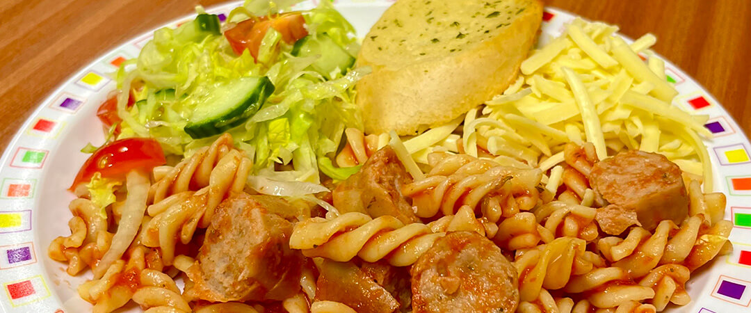 Pork sausage in a savoury tomato sauce