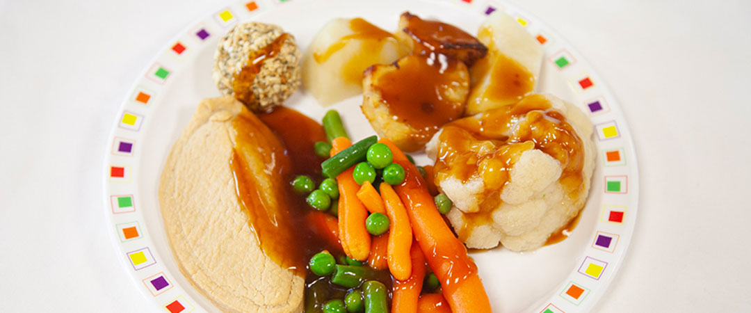 Quorn fillet with roast and boiled potatoes, selection of vegetables and gravy