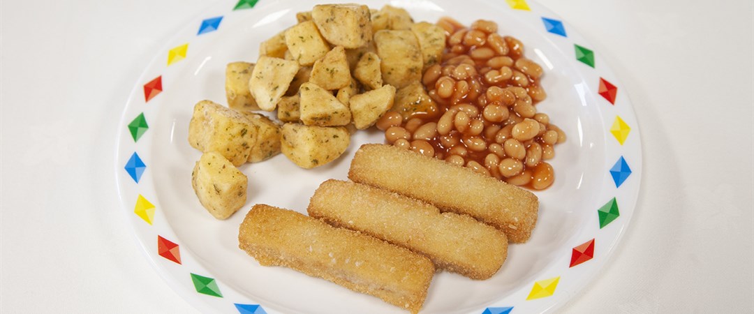 Salmon fish fingers with herby diced potatoes and baked beans or peas