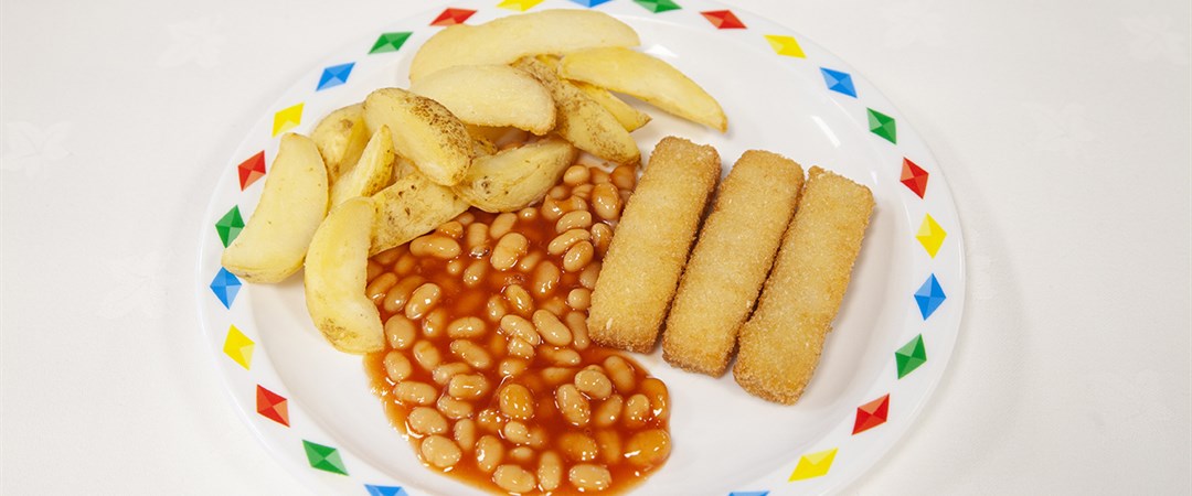 Salmon fish fingers with potato wedges and baked beans