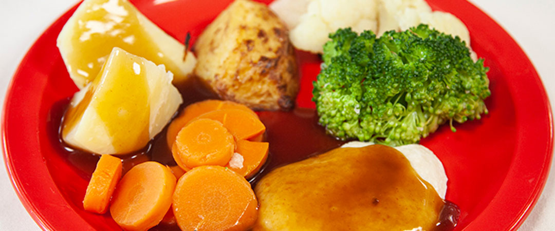 Chicken Breast and Stuffing with Roast & Boiled Potatoes, Vegetables and Gravy