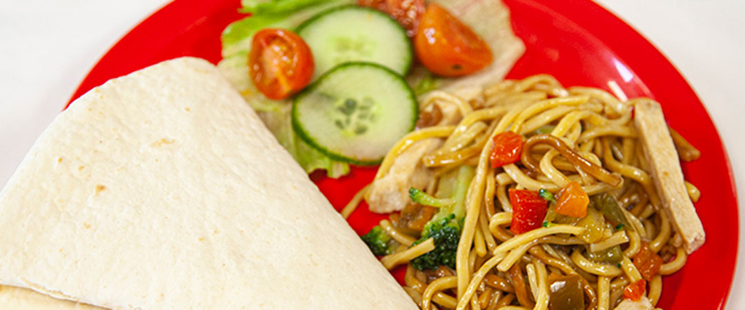 Quorn Strips with Sweet and Sour Vegetable Noodles, Tortilla Wrap and Salad
