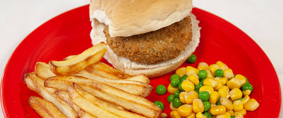 Salmon & Sweet Potato Fishcake in a Bun with Chips, Peas & Sweetcorn