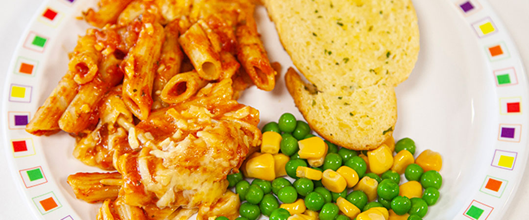 Vegetable Pasta Bake with Vegetables and Garlic Bread