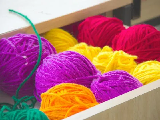 Close up view of coloured wool in a drawer (Pexels - Avni-jain)