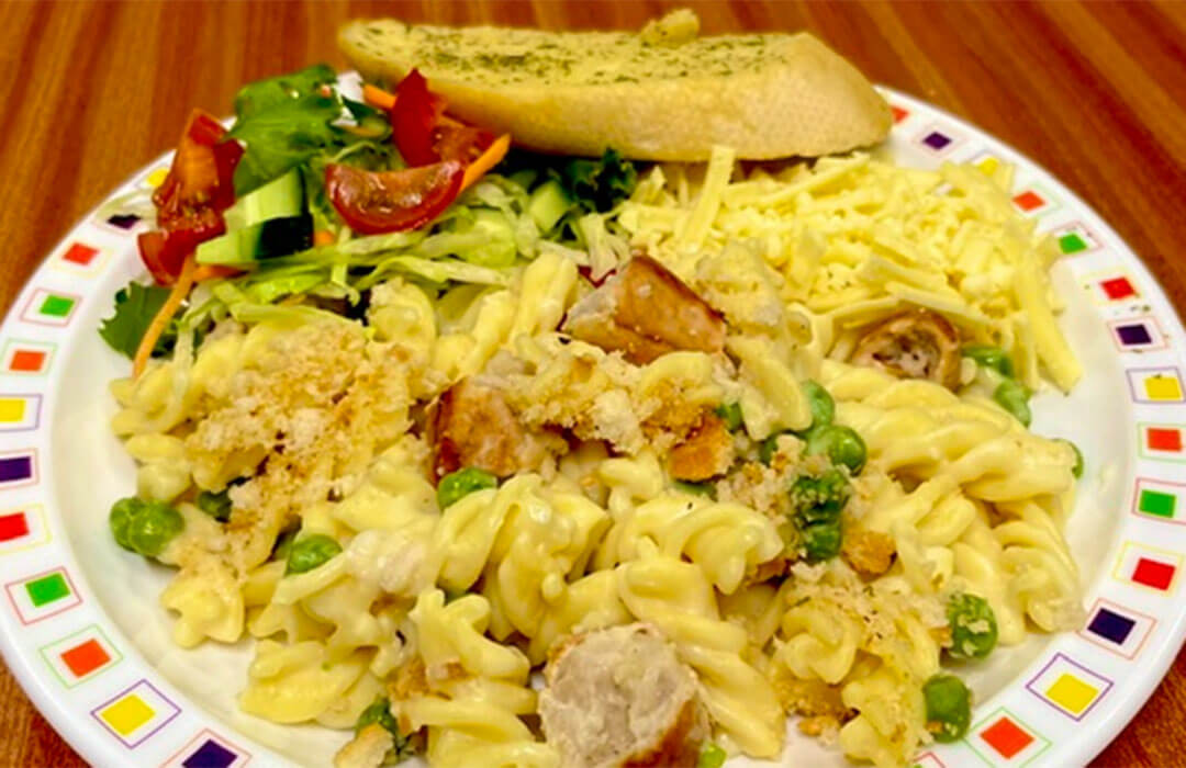 Creamy pork sausage and pea topped with a garlic crumb (pasta meal of the day)