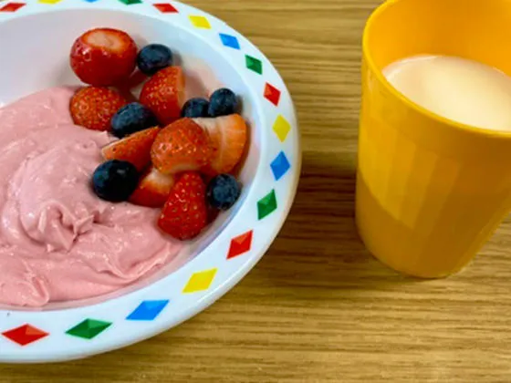 Fruit, whirl, and a glass of milk