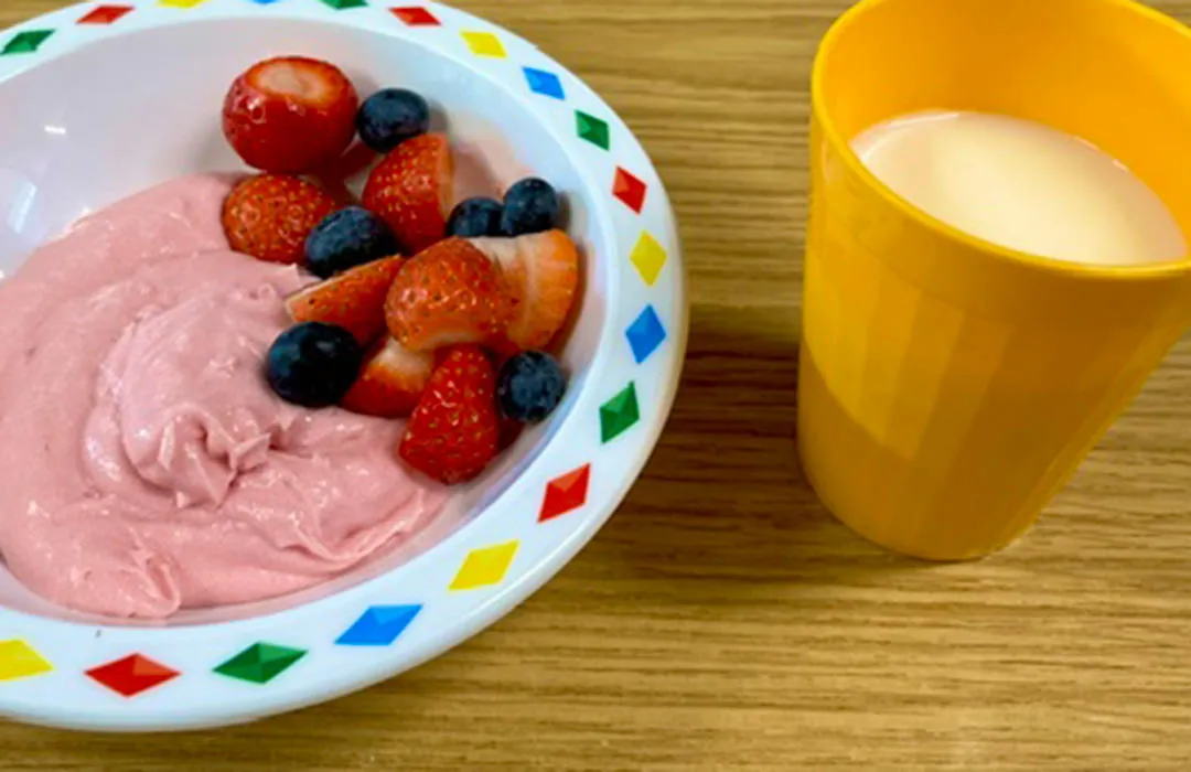 Fruit, whirl, and a glass of milk