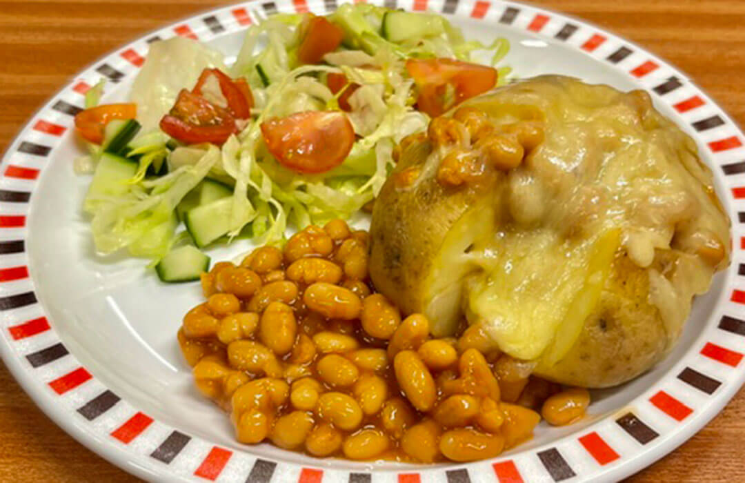 Jacket potato, beans and cheese with salad