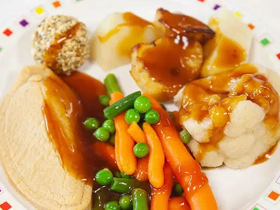 Quorn fillet (Ve) with stuffing, seasonal vegetables, roast potatoes, boiled potatoes and gravy