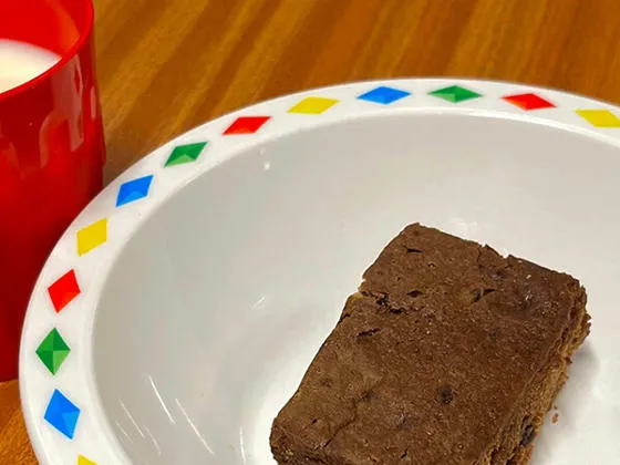 Chocolate brownie and glass of milk