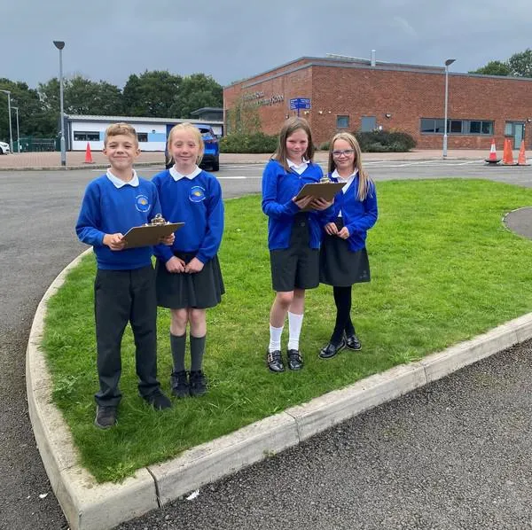 Children monitoring traffic at Blenheim Road Community Primary School