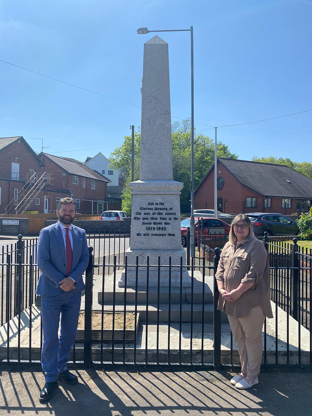Councillors Hunt and Owen standing near the restored War memorial