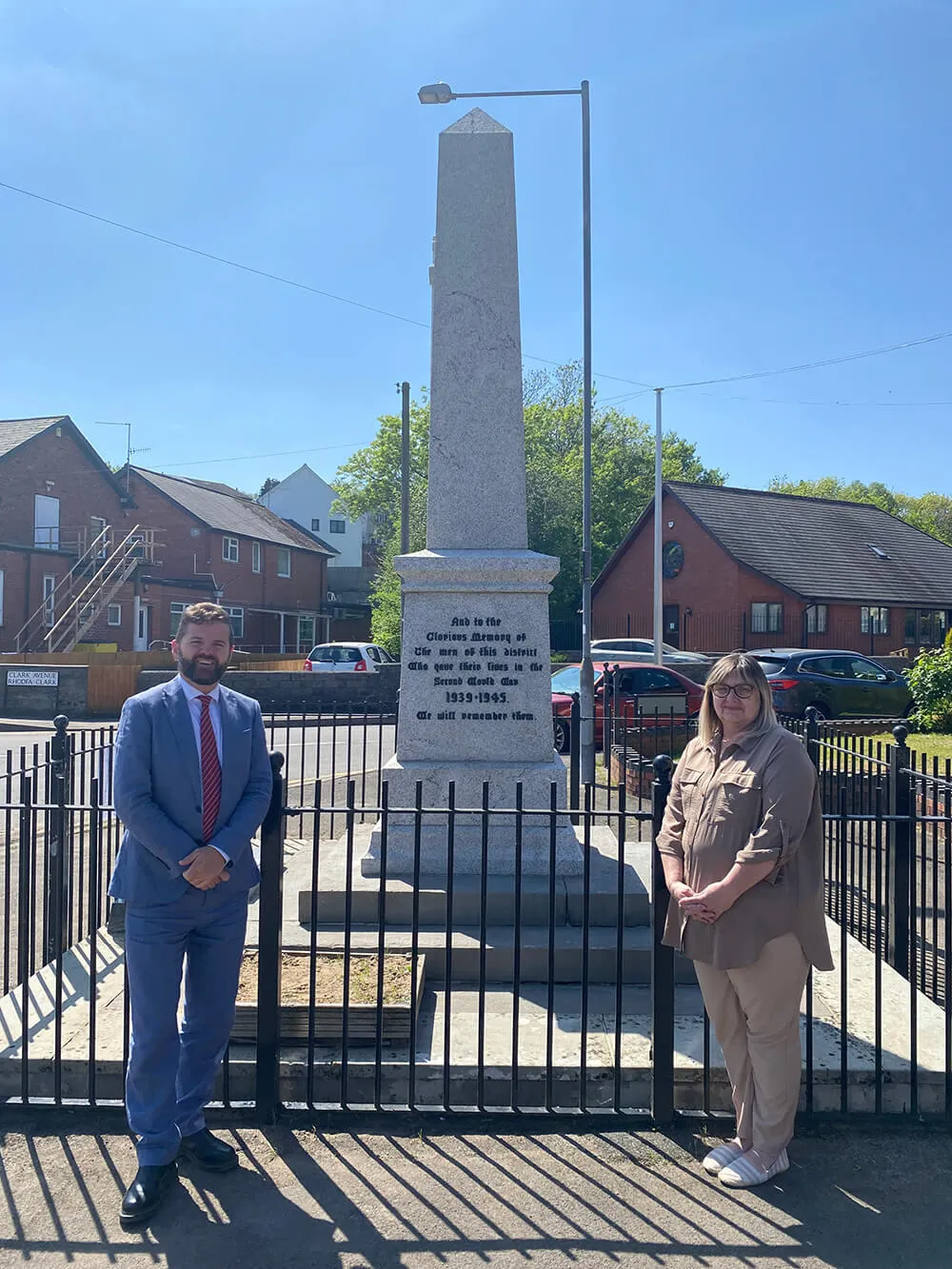Councillors Hunt and Owen standing near the restored War memorial