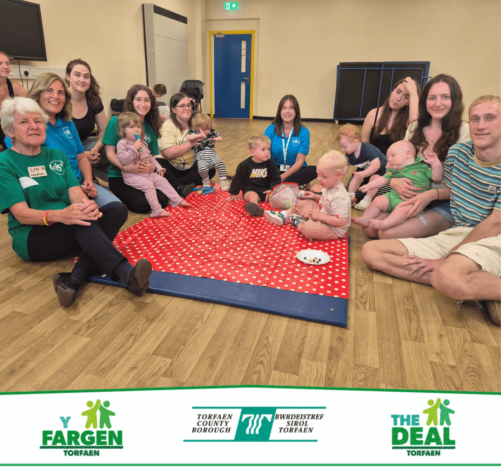 Volunteers and children at the Pop in and Play session