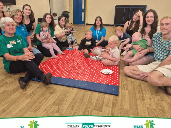Volunteers and children at the Pop in and Play session