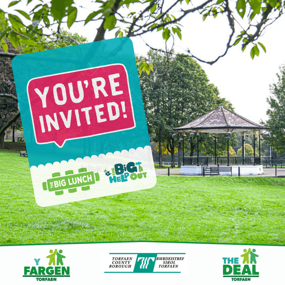 Pontypool bandstand in the background with advertising for The Big Help Out