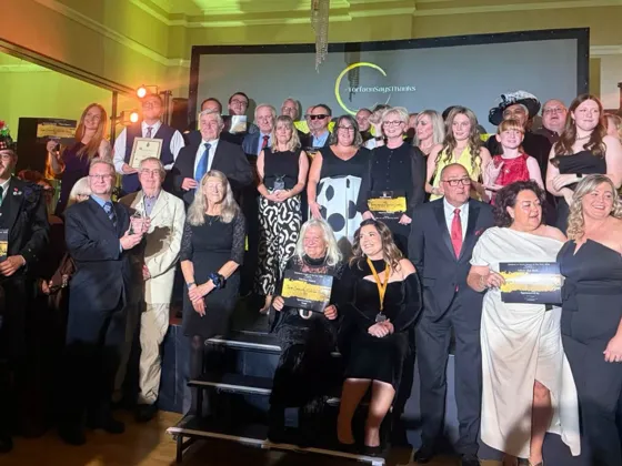 Group photo of volunteers at the awards ceremony