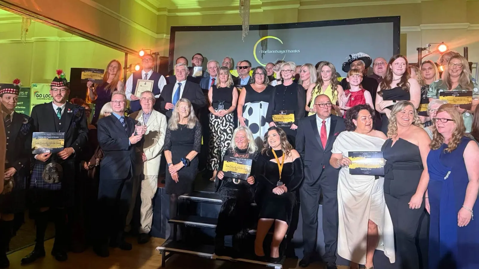 Group photo of volunteers at the awards ceremony